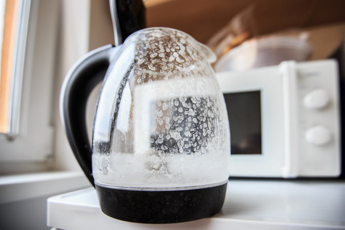 Hard water causing spots on dishes and scale buildup on fixtures